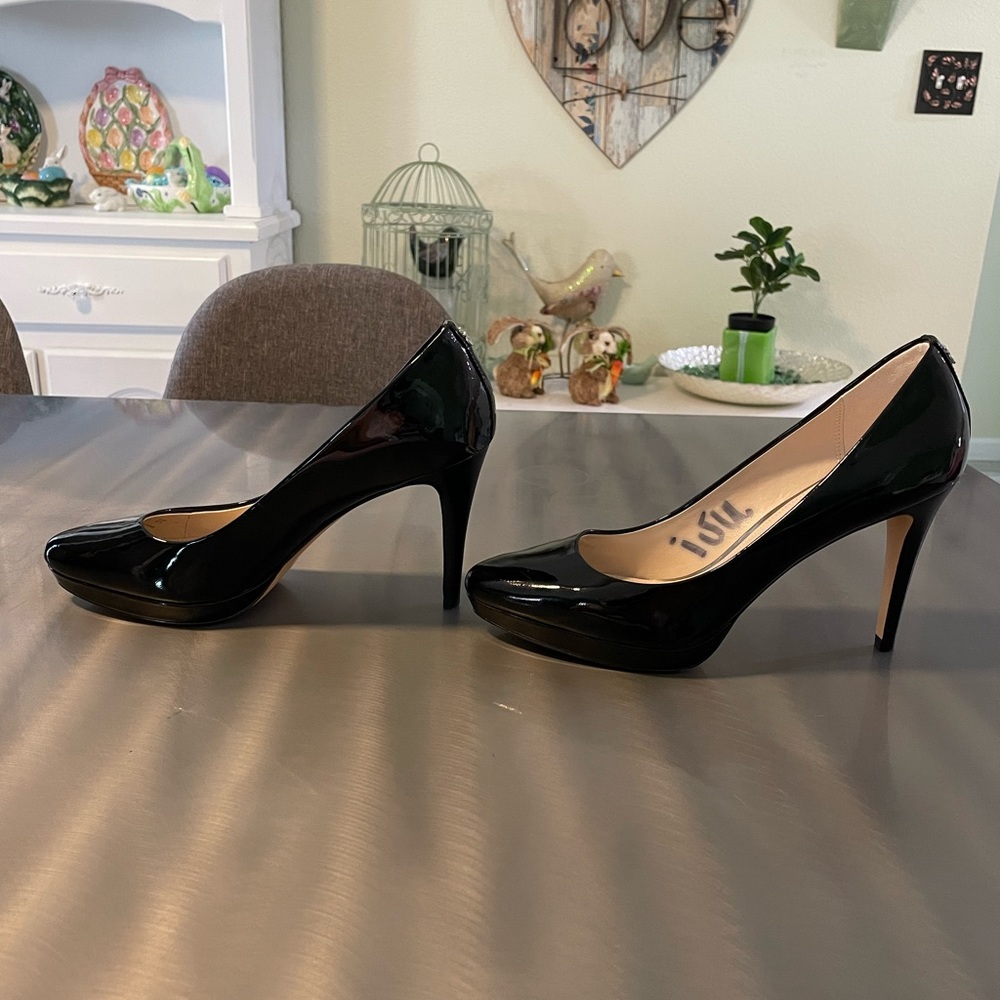 Coach Platform Pumps